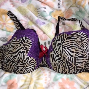 Animal print bra with red bow.